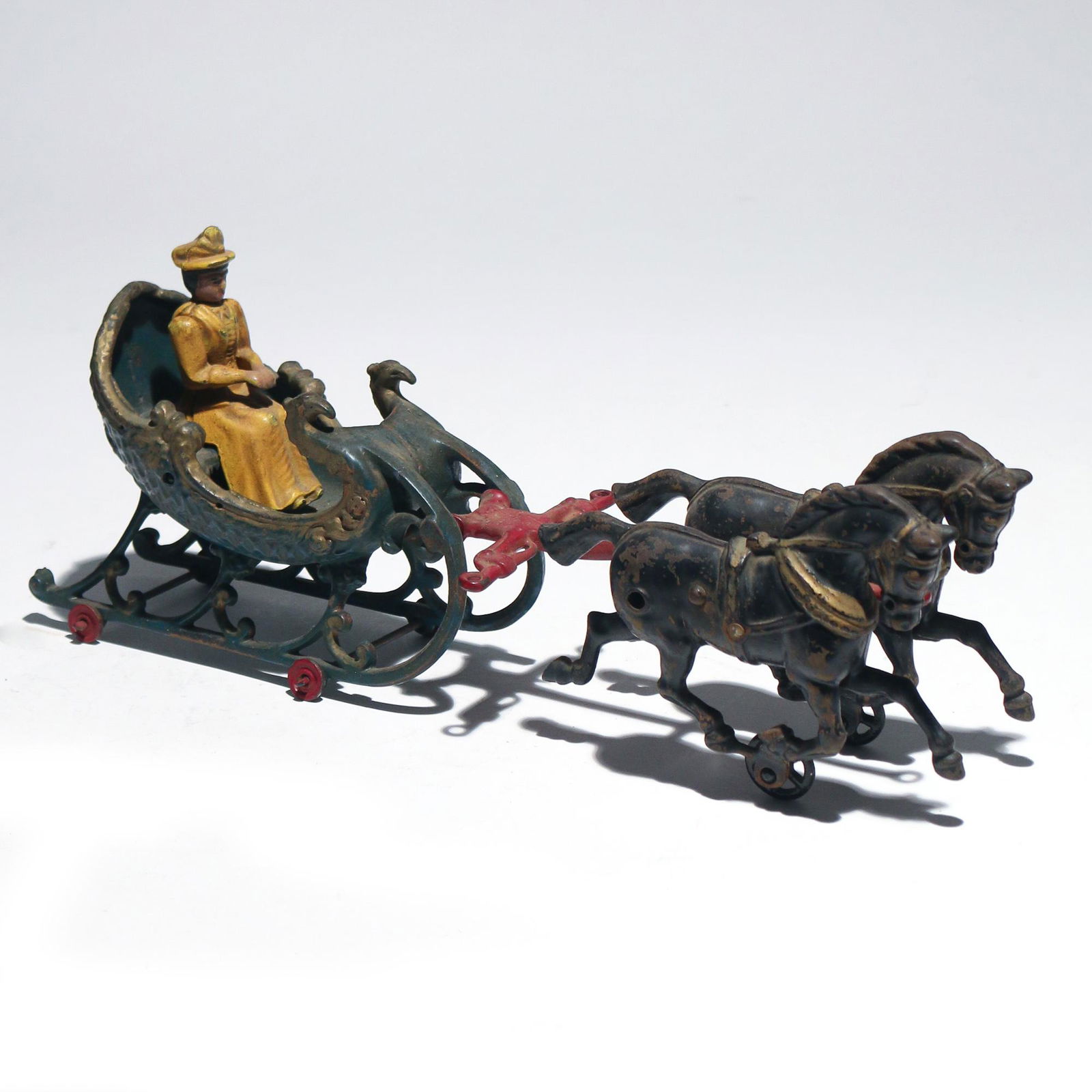CAST IRON HORSE DRAWN SLED (1 of 3)