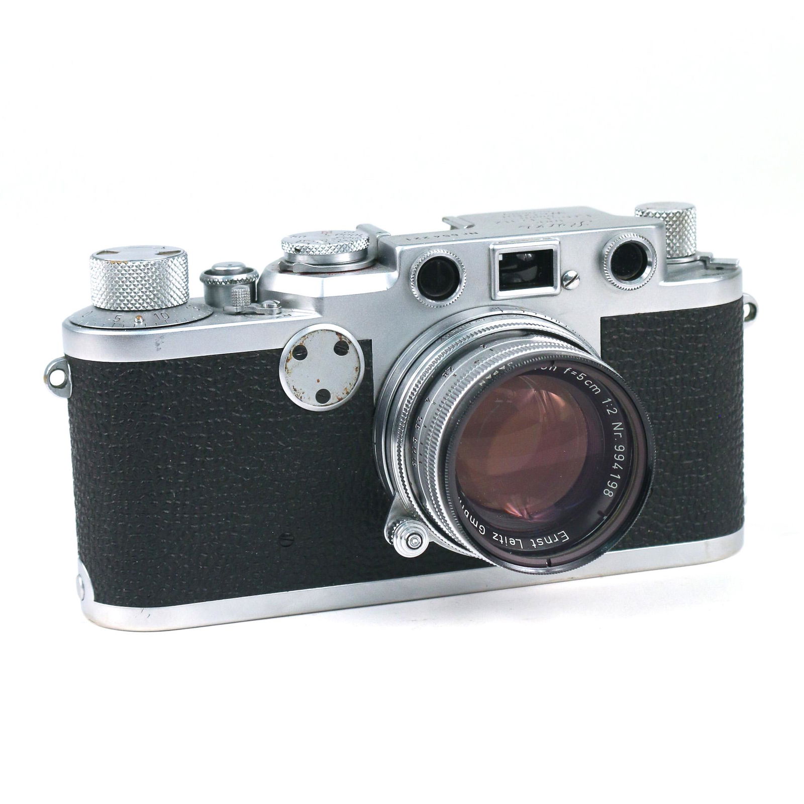 LEICA II RANGEFINDER CAMERA, 654221: metal frame with black grip, Ernst Leitz Wetzlar Summicron lens with Hoya filter s/n 994198, top marked "LEICA / DRP / Erntz Leitz / GmbH / Wetzlar / Germany" and "Nr. 654221" h. 2-3/4 w. 5-3/4 d. 2-1