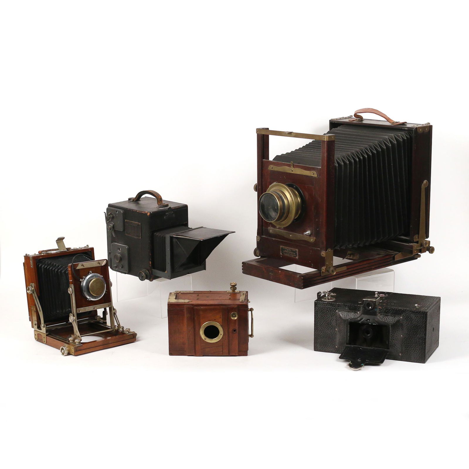 (6pc) KODAK & OTHER BOX & BELLOWS CAMERAS: including an Eastmanview No. 2-D with a Wollensak Studio Shutter Style B. No. 2 lens; a Graflex Graphic Supermatic (x) with a Kodak Ektar lens; a Kodak leather box camera; a Kodak Bantam Special Compu