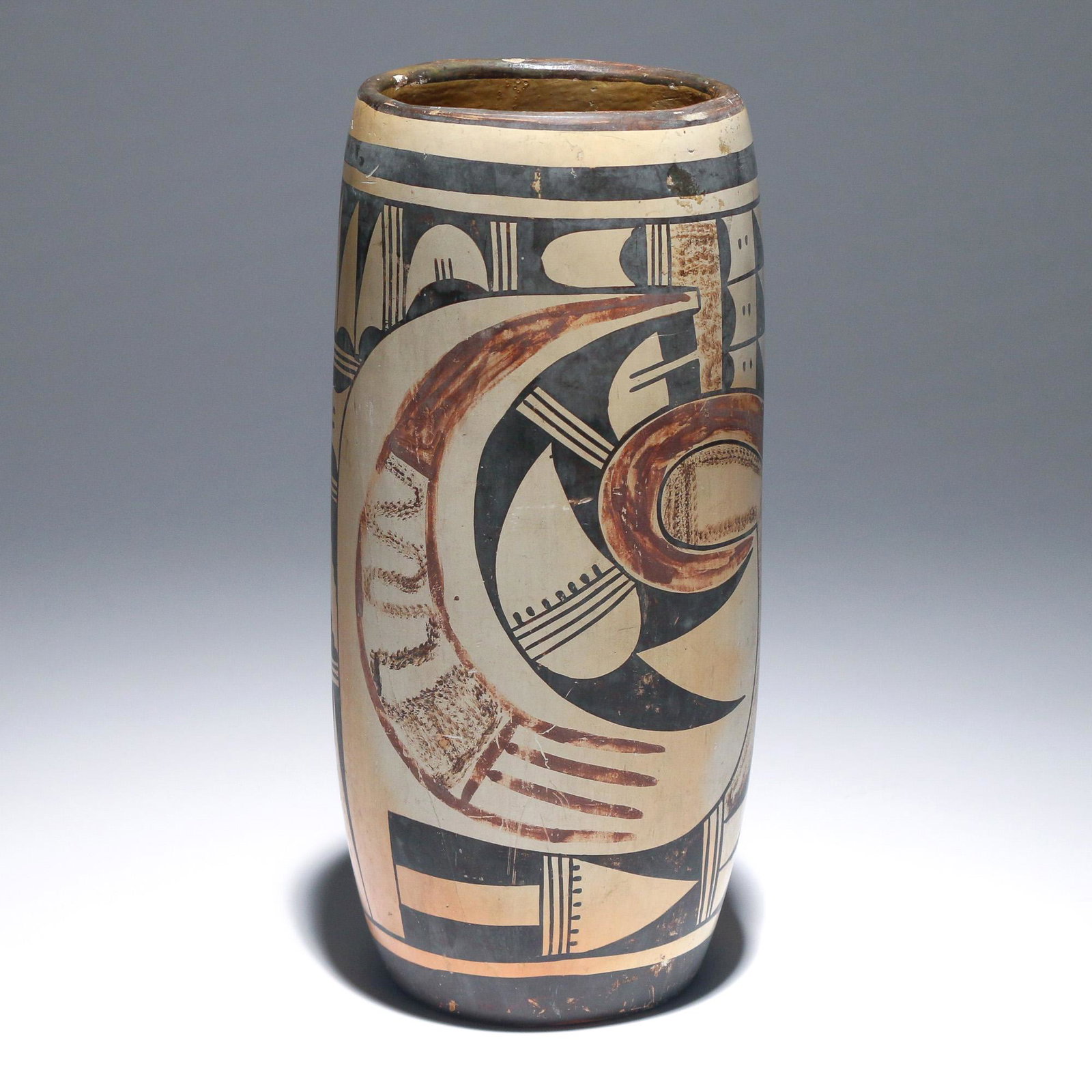 HOPI POLYCHROMED EARTHENWARE VASE: 20th century, with geometric devices, signed with corn motif on underside h. 10-1/4 in. dia. 4-1/2 in. Provenance: Estate of late Robert C. Marshall, Seymour, CT.