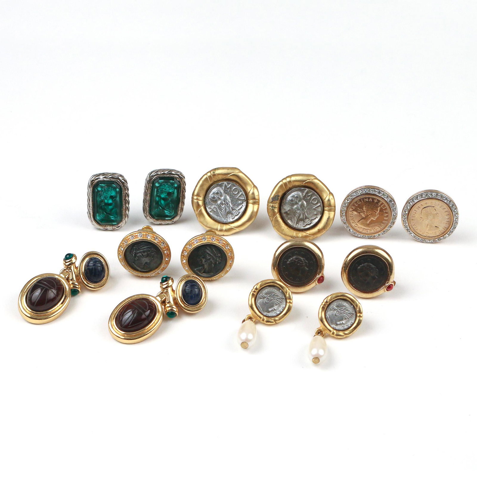 (14pc) COIN, INTAGLIO, & CARVED COSTUME EARRINGS: Including a pair of Greek Athena Owl coin form earrings with bamboo pattern surrounds, a pair of Panetta earrings mounting Elizabeth Regina II coins, a pair of Greek coin earrings with pearl drops, a 