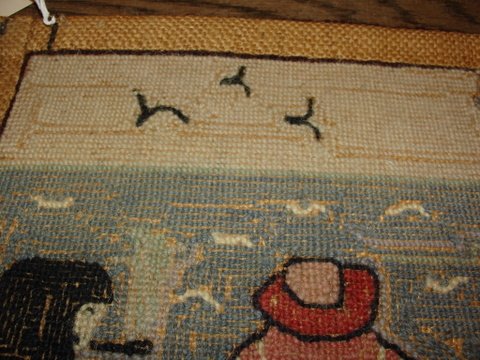 GRENFELL TYPE MAT SHOWING 3 FIGURES & ANIMALS LO - 4