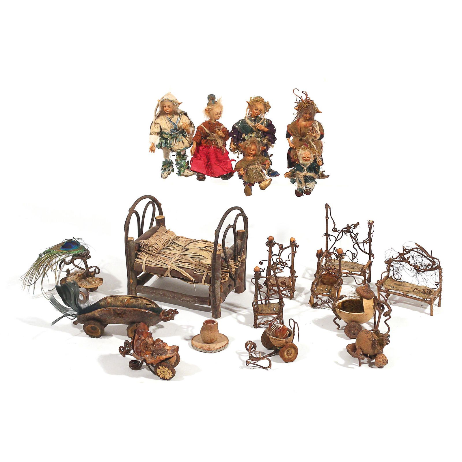 (19pc) MINIATURE FAIRY FURNITURE & FIGURES: miniature woodland faerie furnishings crafted with natural materials, including: a bed with heart shaped headboard; 5 benches and chairs; a small round table; 6 wheeled carts, made with materials such