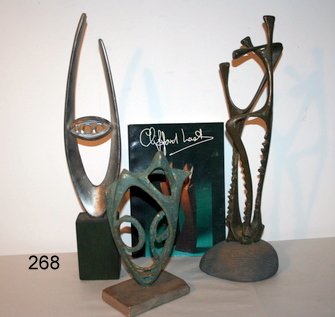 3 -CLIFFORD FRANK LAST (AUSTRALIAN, 1918-1991) SC: 1 BRONZE H: 18", 2 COMPOSITION; ONE OF THE COMPOSITION SCULPTURES H: 16", THE OTHER 10.5"; MINOR DAMAGE ON ONE OF THE COMPOSITIONS, W/BIOGRAPHY OF ARTIST