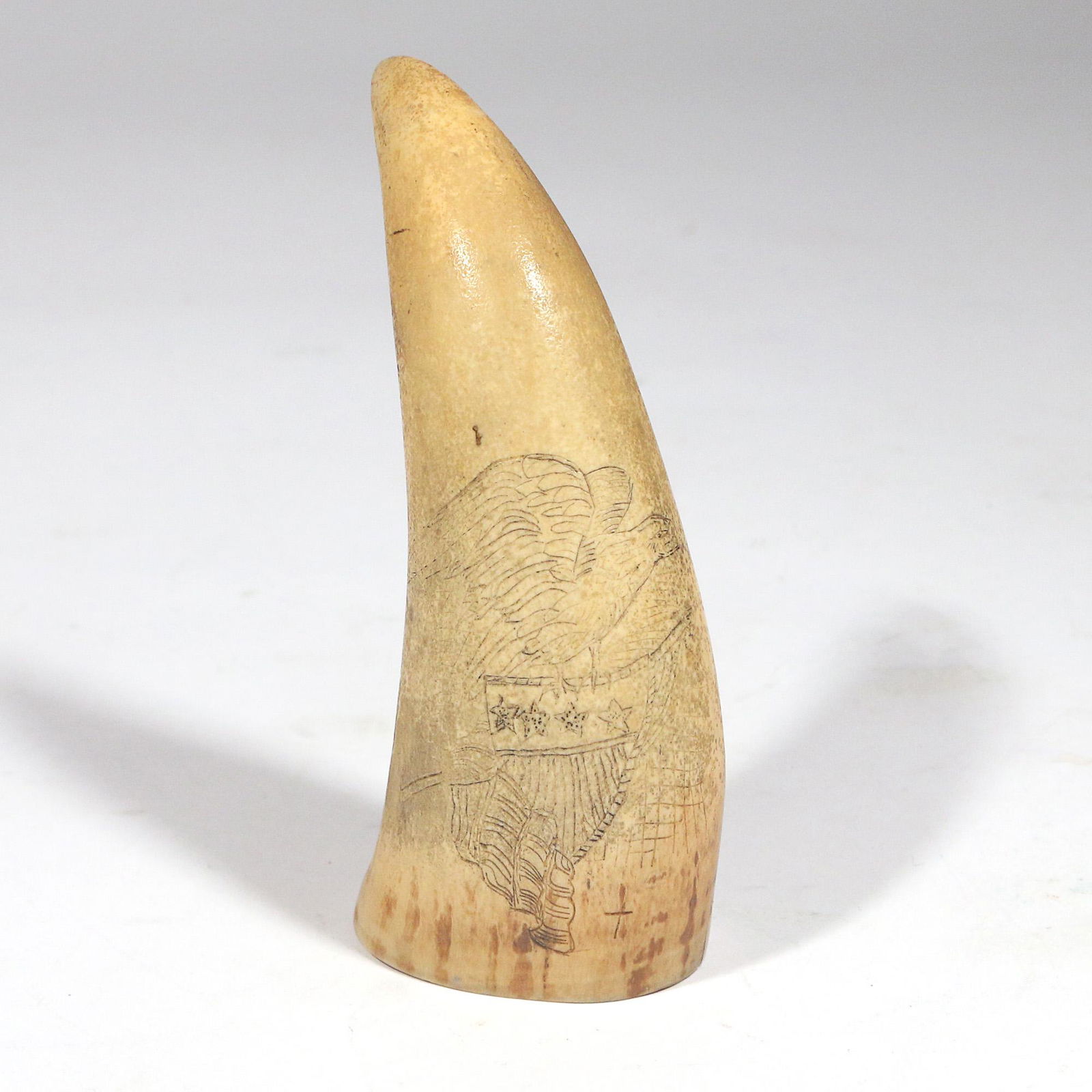 ANTIQUE SCHRIMSHAW: h. 4-1/4 in. showing etched eagle mounted U.S. shield Provenance: Private collection, Tenafly, NJ Limited Preview: Please note that this auction has a limited in-person preview. Not all items may be o