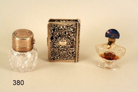 380) 3-PC. LOT: GORHAM STERLING SILVER BOOK JACKET: W/ OPENWORK; 3 TOZ, 4 X 3", H. 3/4"; CUT GLASS COLOGNE BOTTLE W/BLK. STAR & FROST STRL. S. LID; GUERLAIN PERFUME BOTTLE W/SHALIMER LABEL
