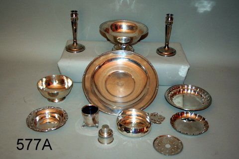 577A) LOT MISC. STERLING SILVER, INCL.:: PR. CEMENT FILLED CANDLESTICK; CEMENT FILLED COMPOTE W/DMGD. BASE; PORRINGER W/DENTS; 12" UNDER PLATE; CIGARETTE HOLDER; WINE COASTER W/INSERT; TIFFANY 4" DISH; PAUL REVERE-STYLE BOWL; ETC. TOT. WGT.