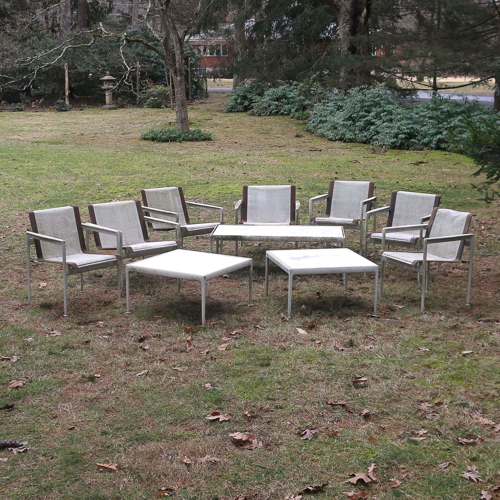 RICHARD SCHULTZ ‘1966’ PATIO FURNITURE SUITE: Comprising seven armchairs with brown leather edges, a coffee table, and two square tables Provenance:Items descended through an important Scarsdale, NY family, including designer mid-century furnishi