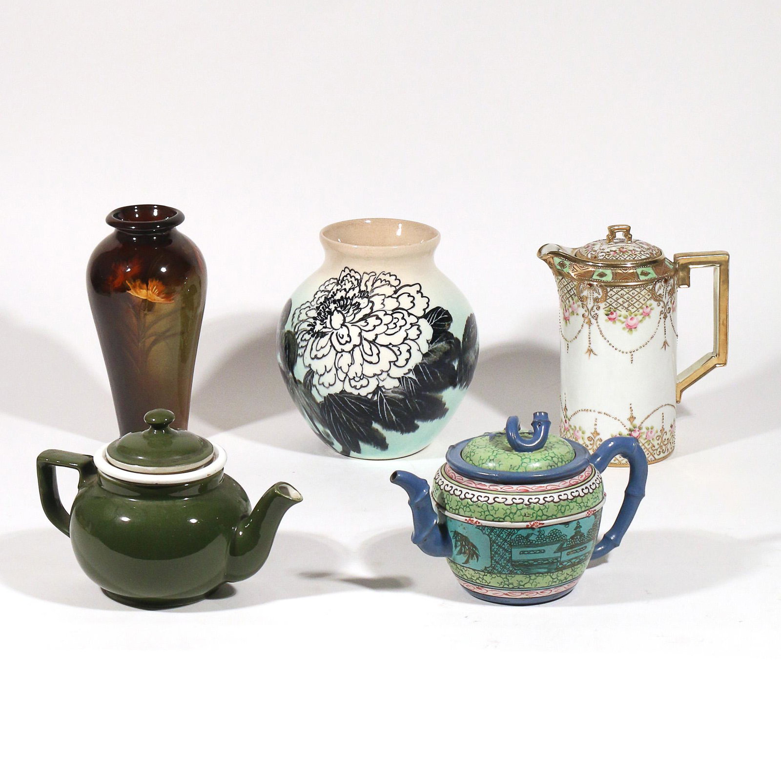 (5pc) MISC. POTTERY & PORCELAIN, INCL. J.B. OWENS: including a hand-painted Nippon chocolate pot decorated with pink flowers and gold garlands (h. 7-1/2 in.); a blue painted clay bamboo form teapot decorated with various scenes and having an imprinted