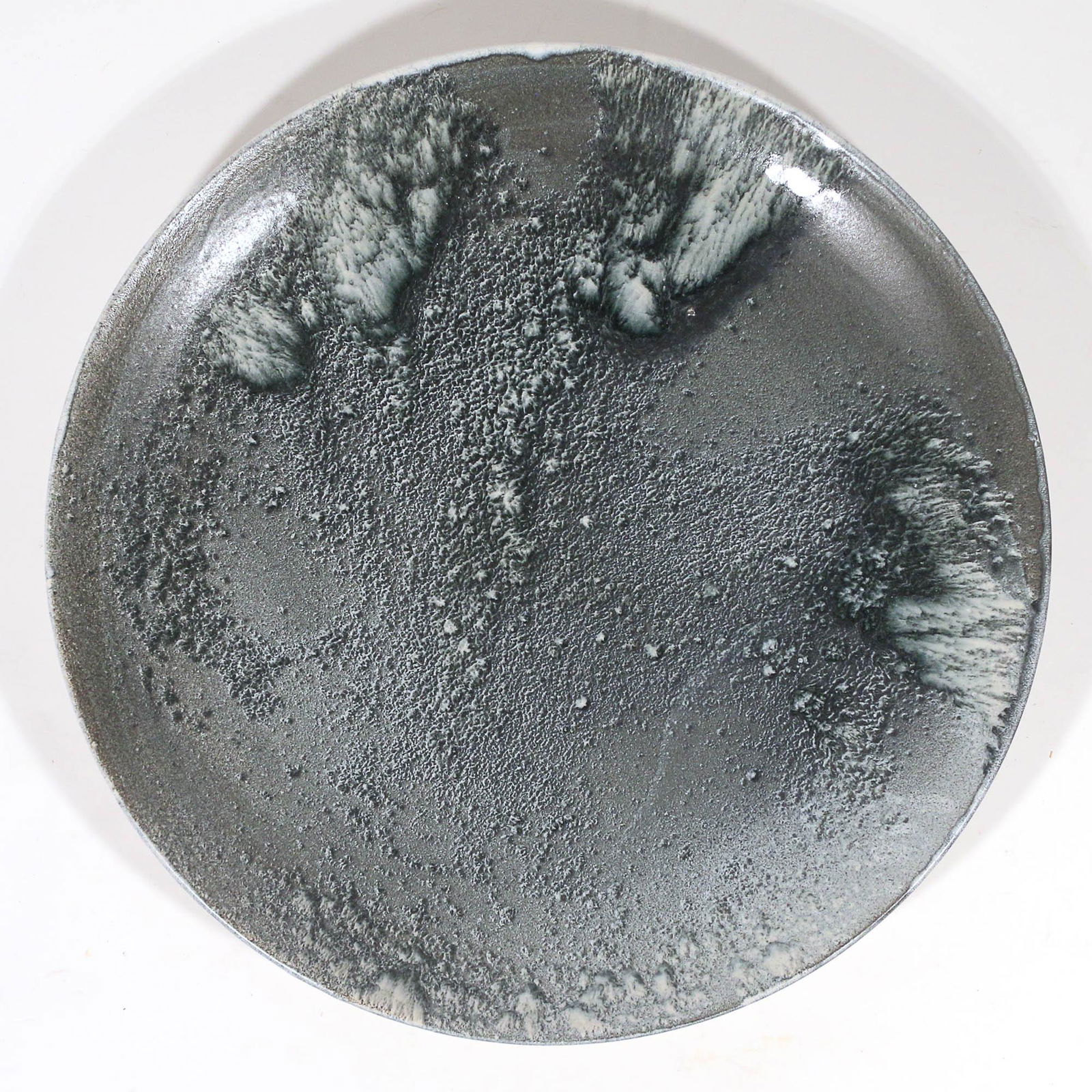 CONTEMPORARY JAPANESE CERAMIC CHARGER: NoMa: having multiple shades of green, gray, black, and white; signed on back h. 2-3/4 dia. 21-3/4 in. Provenance:from noma restaurant in Denmark, originally purchased at Wright Auction