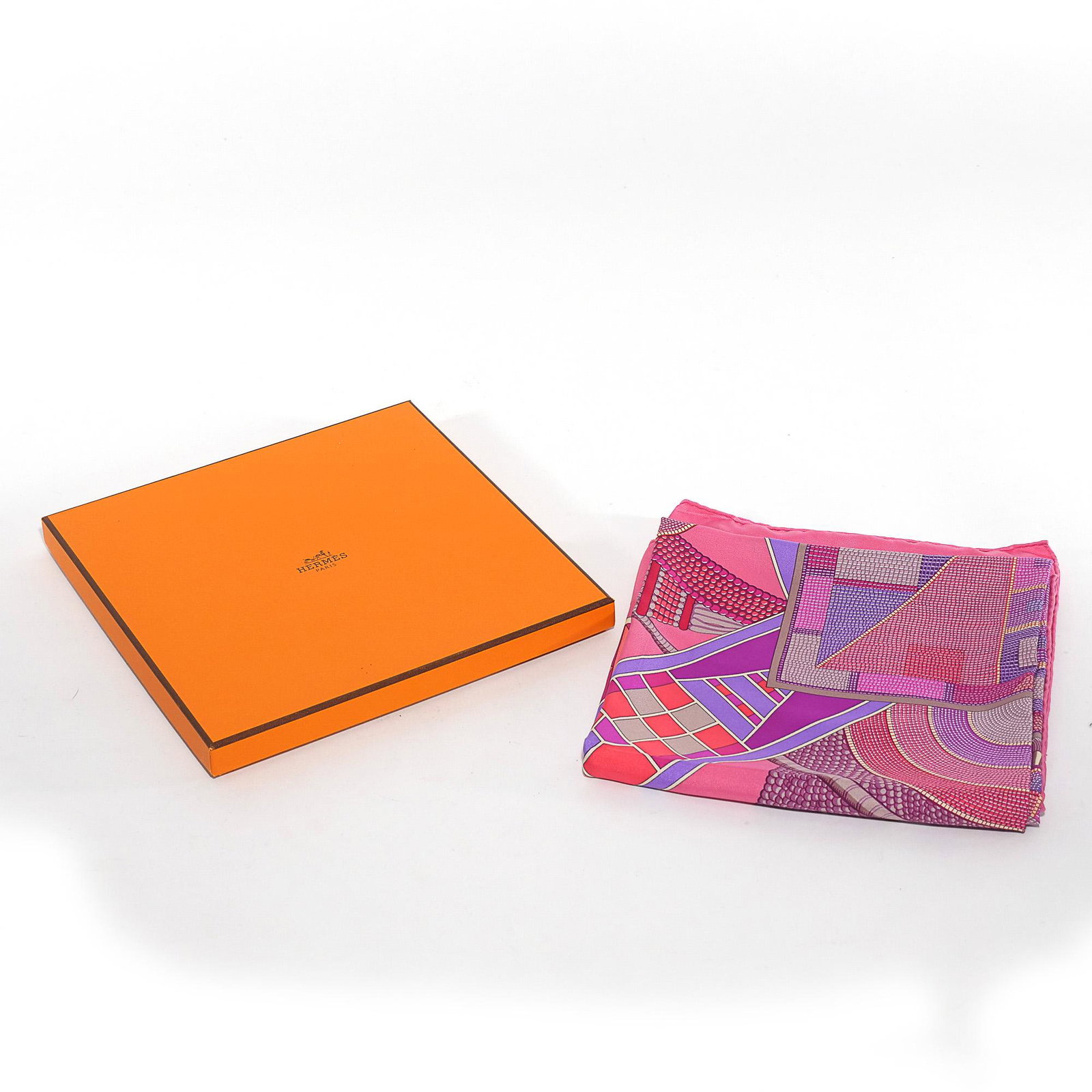 HERMES PARIS SILK SCARF: Silk scarf in multi shades of pink and purple; with accompanying box h. 35 w. 35 in. Provenance: Private collection, Greenwich, CT Limited Preview: Please note that this auction has a limited in-perso