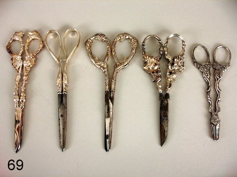 69) LOT: 5-PAIR GRAPE SCISSORS, 4/W-STERLING SILVER : HANDLES: 1-AESOPS FABLES,SHOWING FOX & GRAPES, L. 6 3/4"; 2ND MKD. WHITING W/WHIPLASH HANDLE TERMINATING DUCK HEADS, L. 7"; 2-PR. W/GRAPE CLUSTER MOTIF 1-VERY HEAVY, L. 7 1/4 & 6 1/4" PLUS NON STERLIN