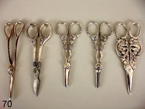 70) LOT: 5 PAIRS GRAPE SCISSORS: 1-W/SATYR, MKD. '800' : SILVER, L. 5 1/2"; 2ND W/GRAPE MOTIF, MKD. STERLING, U.B., W/ABRASIONS ALONG LOWER HANDLE; 2-PAIRS, MKD. MADE IN SWEDEN W/GRAPE MOTIF, SILVER PLATE ; 5TH SILVER PLATE