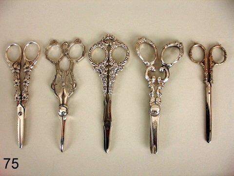 75) LOT: 5 PAIRS GRAPE SCISSORS, 2-W/STERLING SILVER : HANDLES, 1-MKD. UNGER BROS., 3RD. MKD TIFFANY &CO, SILVER PLATE; 4TH PROBABLY PLATE W/BUTTERFLY FORM; 5TH WITH NO MK. AND GRAPE MOTIF