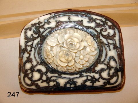 247) ANTIQUE IVORY & SIVER OVERLAY LADIES PURSE, : W/CARVED HIGH RELIEF FLOWERHEADS WITHIN CARTOUCHE SURROUNDED BY SILVER OVERLAY, OTHER SIDE W/PENWORK HERALDRY DEVICE, 3 X 2 1/2", MISSING PC. OVERLAY @ CORNER