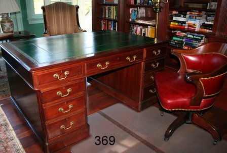 369) 19C ENGLISH, MAHOGANY PARTNERS DESK W/INSET GREEN : LEATHER TOP W/TOOLING, 3 FRIEZE DRAWERS & 2 BANKS OF 4 DRAWERS ON ONE SIDE & 3 DRAWERS OVER 2 CABINET DOORS ON OTHER SIDE, D. 42", W. 60", H. 30" PLUS A 19TH C. MAHOGANY & LEATHER BARREL BACK & SWIVEL
