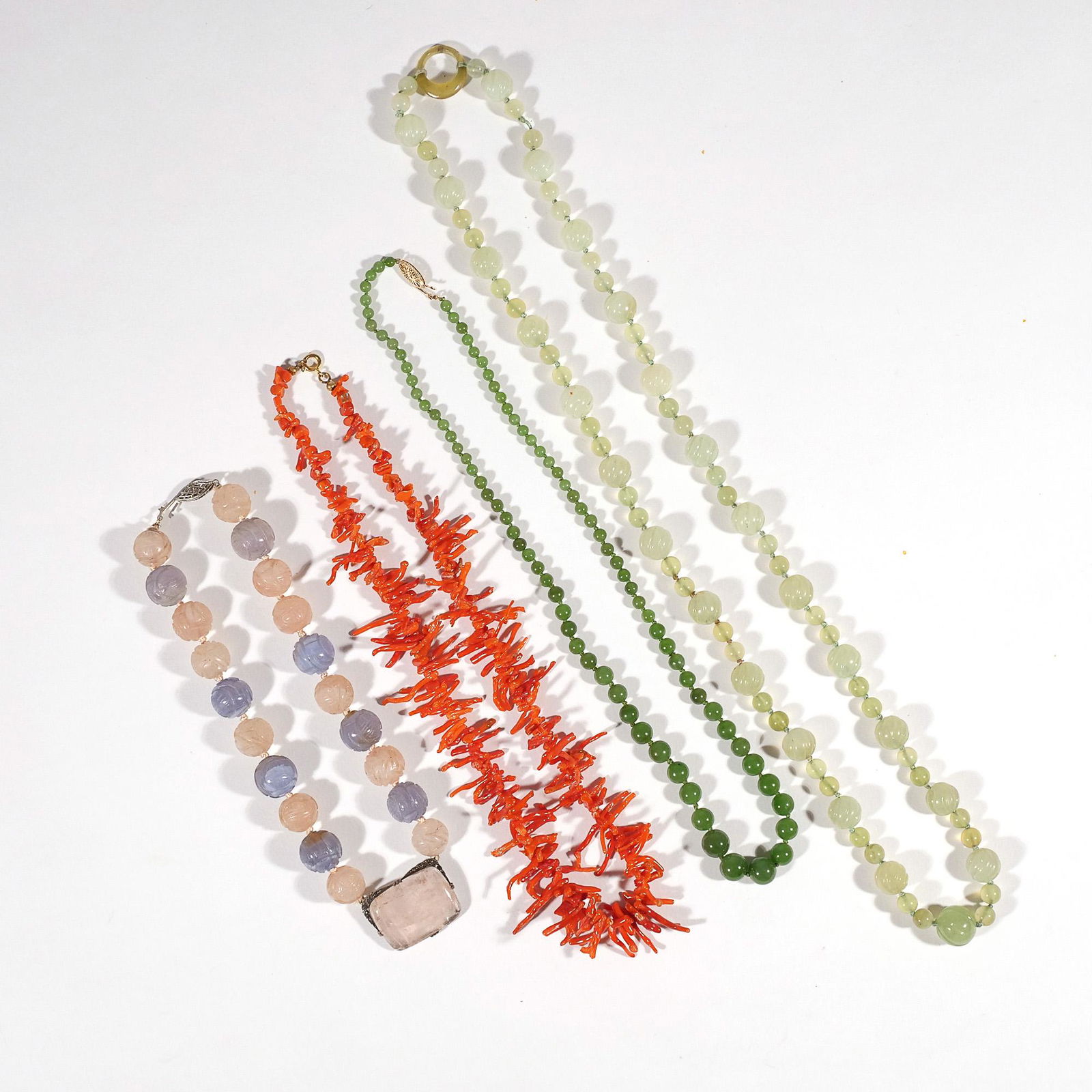 (4pc) MISC. CARVED STONE NECKLACES (1 of 13)