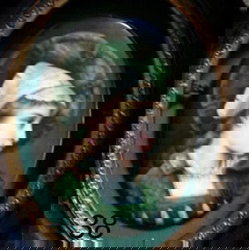 38) KPM-STYLE PORCELAIN OVAL PLAQUE OF YOUNG WOMEN : IN ELIZABETHAN STYLE DRESS W/WIDE BRIM HAT, 4 ¼ X 3 ¼"