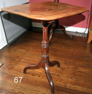 67) REGENCY INLAID TILT-TOP TEA TABLE W/ METALLIC INLAY: ON TOP,TURNED POST WITH TRIPOD LEGS (ONCE FITTED WITH CASTERS); PART OF THE INLAY IS POPPING OUT AND MISSING; SOME FADING ON TOP; ONE LEG HAS BEEN REPAIRED; TOP 21.75" X 19.5" H: 26.5"