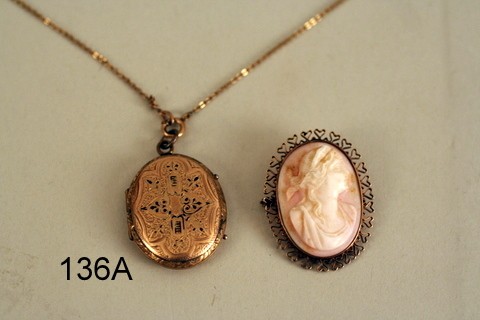 136 A) 2 PIECES: CAMEO W/10K GOLD SURROUND & GREEN GOLD: GOLD VICTORIAN LOCKET W/GOLD PLATED CHAIN