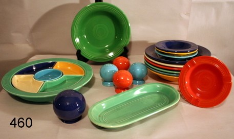 460) FIESTA WARE GROUP 1: INCLUDING: 6 PIECE RELISH TRAY, 7 SOUP BOWLS; 2 PAIRS OF SALT AND PEPPER SHAKERS PLUS 1 SINGLE; 4 ASH TRAYS; AND 1 CONDIMENT DISH; ONE OF THE SOUP BOWLS W/ A CRACK