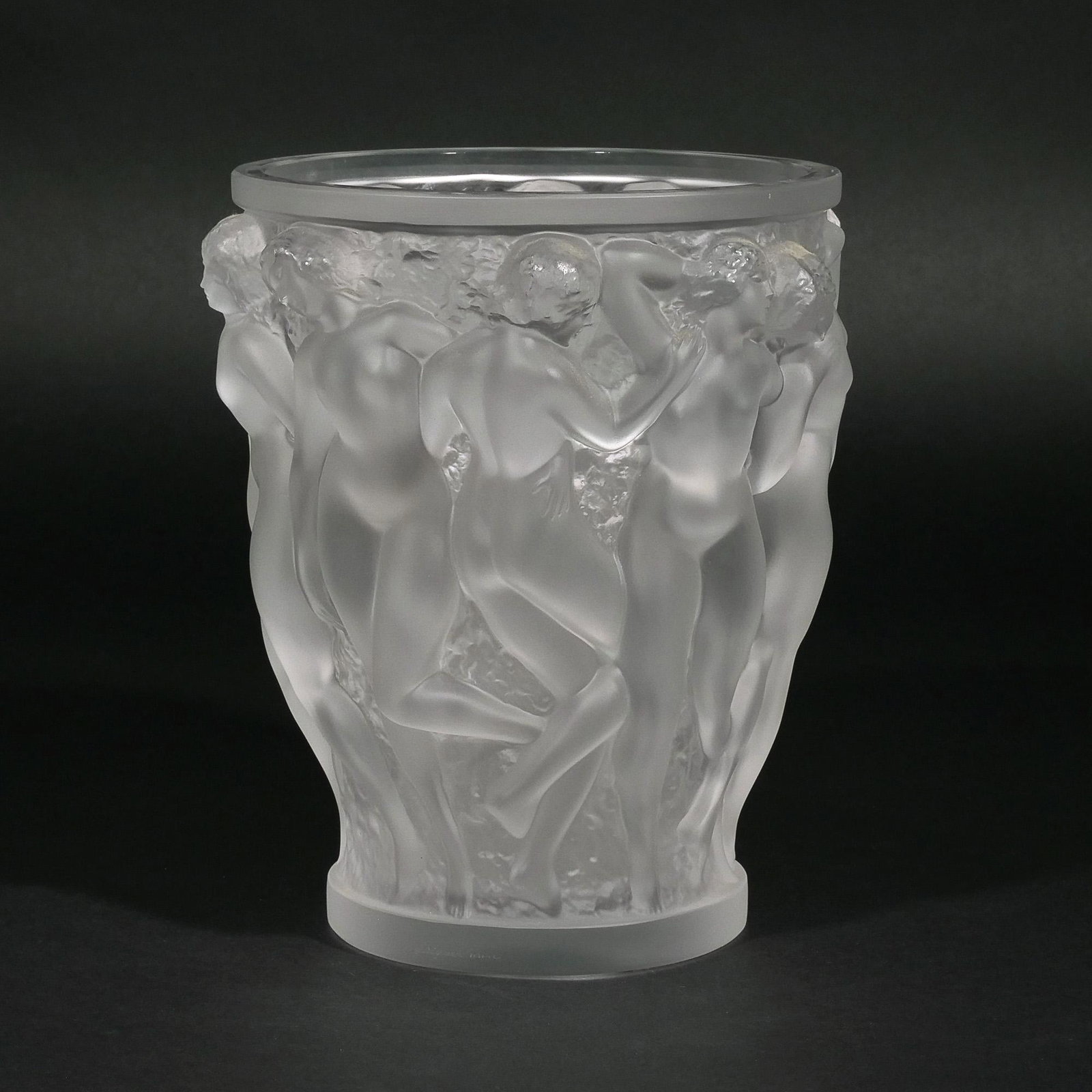 LALIQUE BACCHANTES VASE: Decorated with Art Deco nude female figures in high relief, with incised script signature at base h. 9-1/2 dia. 8 in. Provenance: The collection of Pound Ridge, NY collector n.b. Not all items are on 