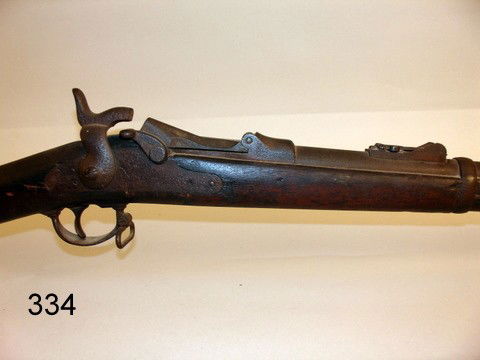 334) SPRINGFIELD TRAPDOOR 45-70 GOVERNMENT ISSUE: PROBABLY 1878 OR 1884 RIFLE, MISSING RAMROD, LRG. STOCK CHIP, BARREL L. 36"