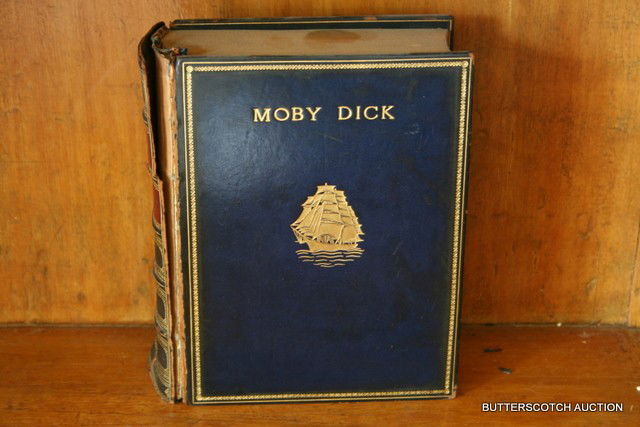 393) MOBY DICK BY HERMAN MELVILLE, ILLUSTRATED BY: ROCKWELL KENT, RANDOM HOUSE; RR. DONNELLEY AND SONS, 1930, IN FULL LEATHER AND 3/4 GILT; BOUND BY SANGORSKI AND SUTCLIFFE LONDON FOR BRENTANO'S; 1 BOARD NOT ATTACHED, BINDING NEEDS WORK;