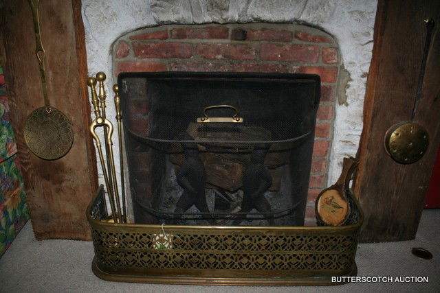 499) FIREPLACE ACCESSORIES: PAIR HESSIAN SOLDIER: ANDIRONS; BRASS FENDER; WIRE SPARK CATCHER; ET AL