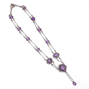 THEODOR FAHRNER STERLING & AMETHYST NECKLACE: Art Nouveau / Jugendstil; designed as a sterling silver double chain necklace joining 11 graduated oval mixed cut amethysts ranging in size from 1.5 - 7.5 carats, impressed "Sterling - TF - Germany";