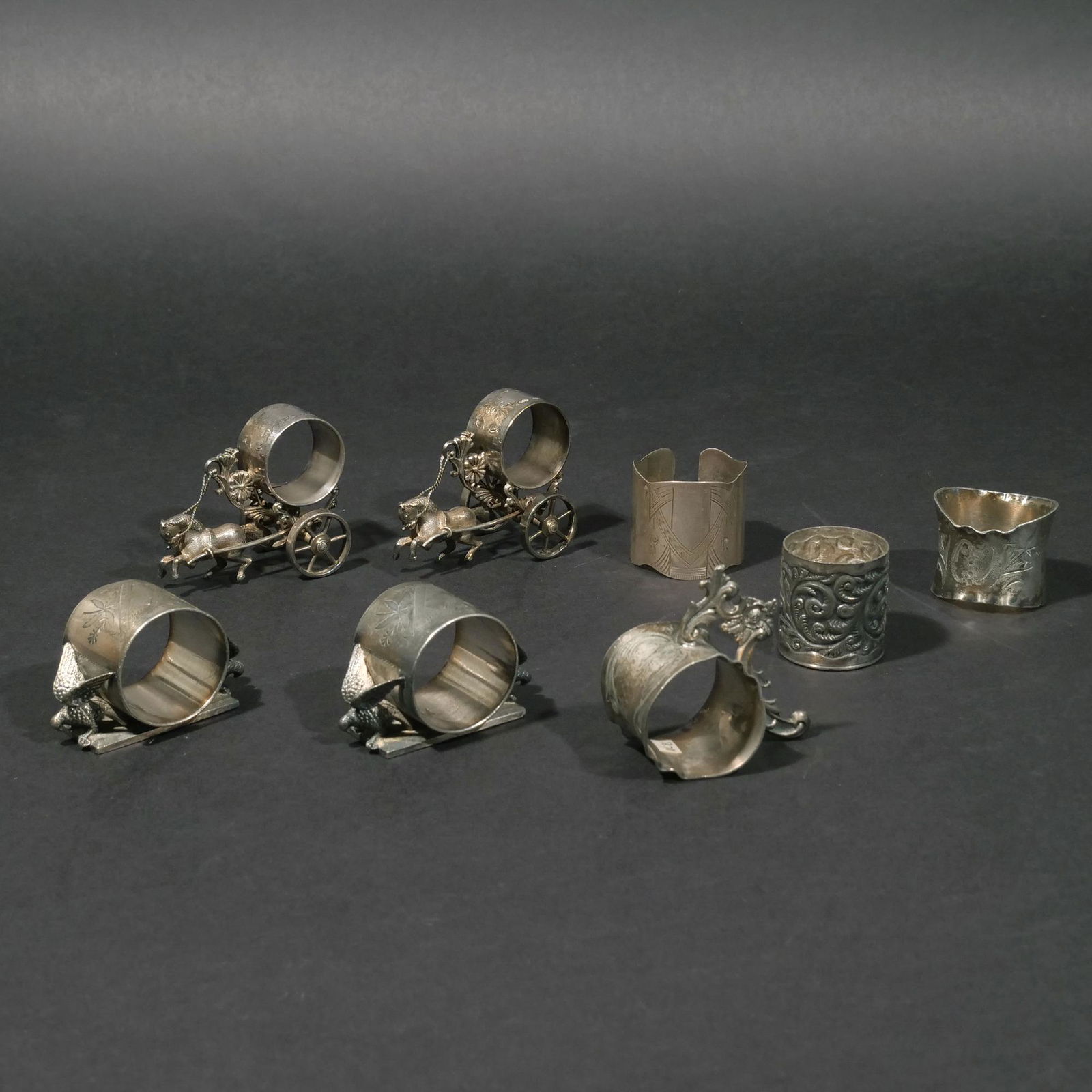 (8pc) VICTORIAN SILVER-PLATED NAPKIN RINGS (1 of 5)