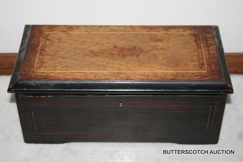 19TH C. INLAID CLYINDER MUSIC BOX IN CONTRASTING: WOODS, PARTIAL ORIG. 4-TUNE SHEET