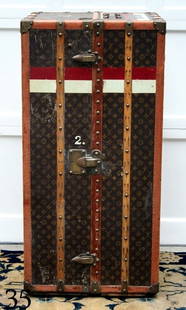 LOUIS VUITTON WARDROBE W/MONOGRAM CANVAS: FITTED INTERIOR, 5 PULL OUT DRAWERS, W/ORIG. LEATHER TABS, HANGERS, ETC.