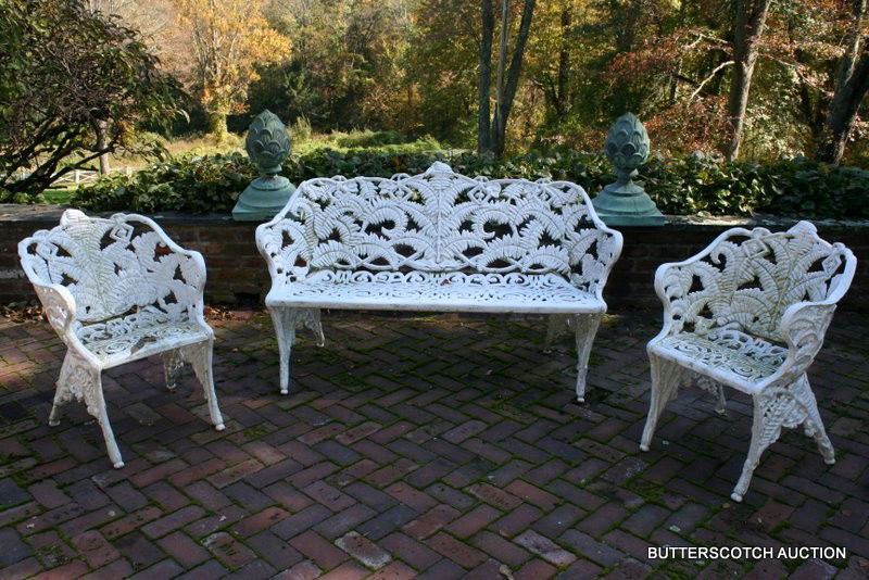 128 4 PC.19TH C. CAST IRON GARDEN SUITE, GRAPE & VINE: INCLD. PR SETTEES & 2 ARM CHAIRS - PLUS 2-E. 20TH C. REPRODUCTION ARMCHAIRS, L.58", H. 34 1/2"