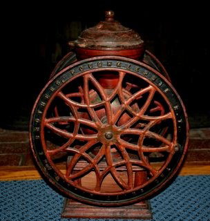 #14 "THE SNUFF MILL LANE BROTHERS POUGHKEEPSIE: N.Y", COFFEE GRINDER, ORIG. PAINT. Height is 21", wheel to wheel is 10.5". All original with the exception of the collector box. Box is wood, with a refinished front.