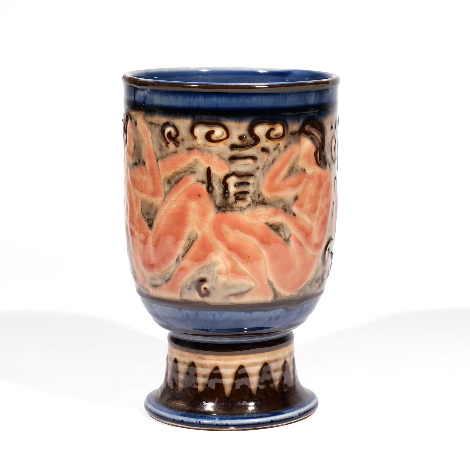 JENS JENSEN for ROOKWOOD POTTERY: Urn-form glazed ceramic vase with nude figures, circa 1944, with artist's monogram, flame mark, date in Roman numerals, and impressed 6185D h. 8-3/4 w. 5-1/2 in. Provenance: The coll. of late Seymour