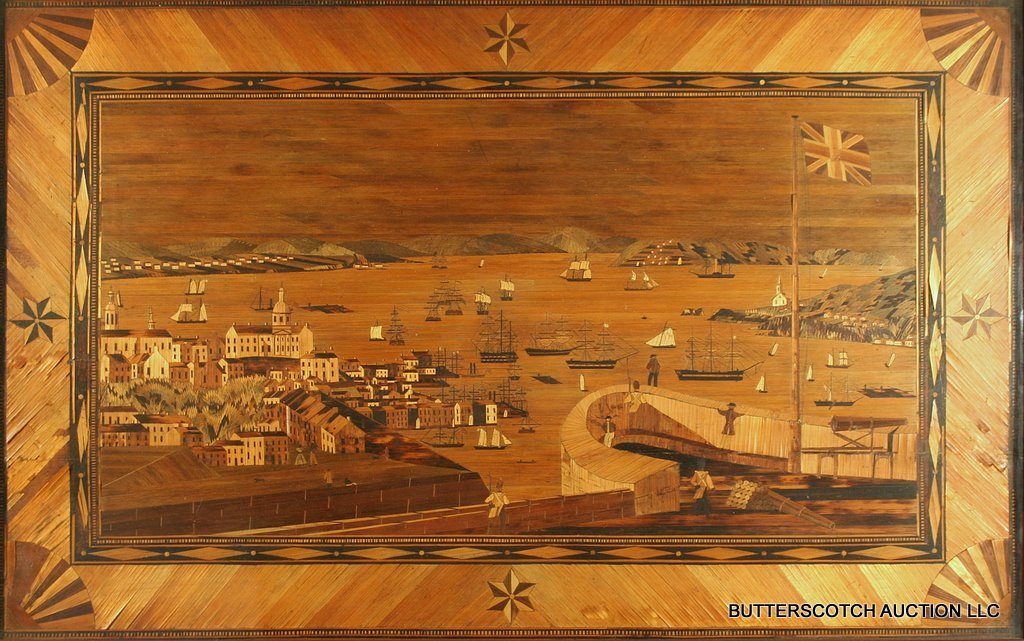 MID. 19TH C. STRAW WORK HARBORSCAPE: W/FORTIFIED FORT W/ENGLISH FLAG, OVERLOOKING TOWN, 19 X 30" ON BOARDW/ SOME MINOR LOSSES IN BORDER, PERIOD FRAME.