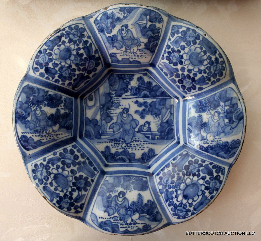 18TH C. DELFT-TYPE BLUE AND WHITE TIN GLAZED: EARTHENWARE DISH WITH LOBED BODY AND SCALLOPED EDGES,, W/ 19TH C. RESTORATION WORK; APPROX. D: 13", 2-OLD STAPLE REPAIRS