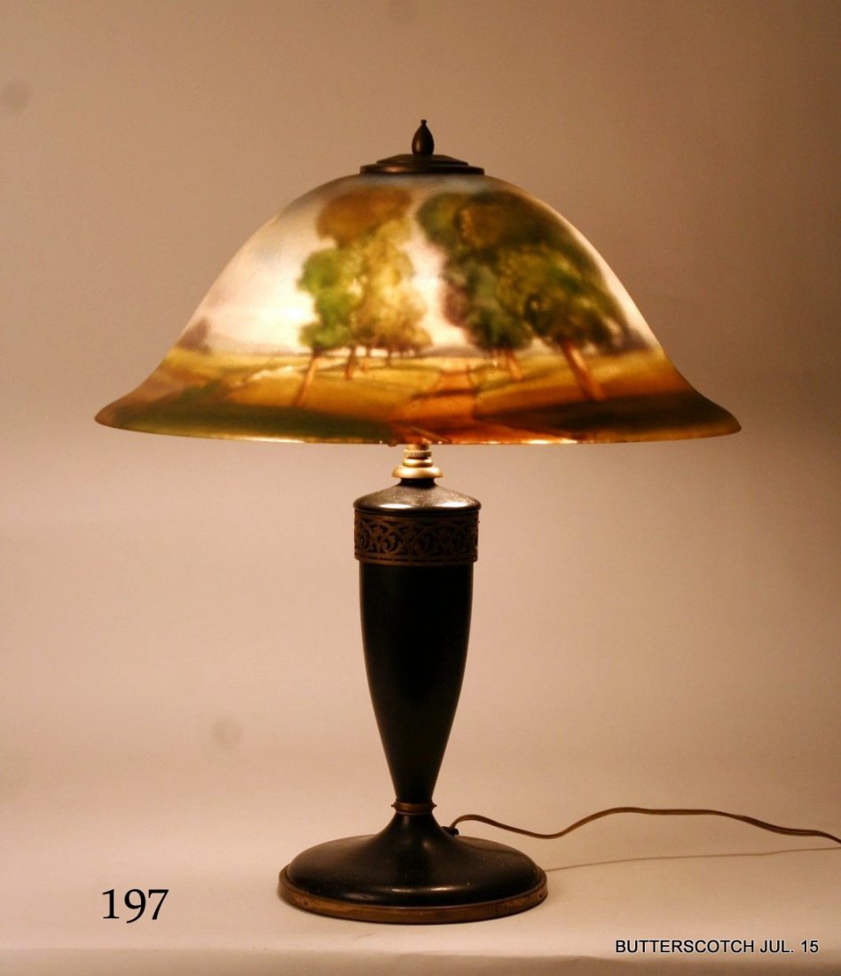 PAIRPOINT REVERSE PAINTED COPELY TABLE LAMP: SHADE PAINTED W/BUCOLIC LANDSCAPE,SHADE DIA.: 18", H. 21", BASE MKD. ON UNDERSIDE, SHADE NOT SGD & W/3-OUTER EDGE CHIPS