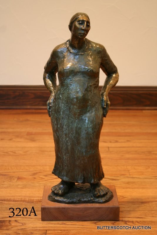 SHIRLEY THOMPSON SMITH ( AMER. 1929 ) BRONZE: NAVAJO WOMAN, H.21 1/2", ED 3/10, 1981, SGD. Born in 1929 in St. Louis, Missouri, Shirley Thomson-Smith's art has been deeply and profoundly influenced by the experience of living in Durango, Colorado
