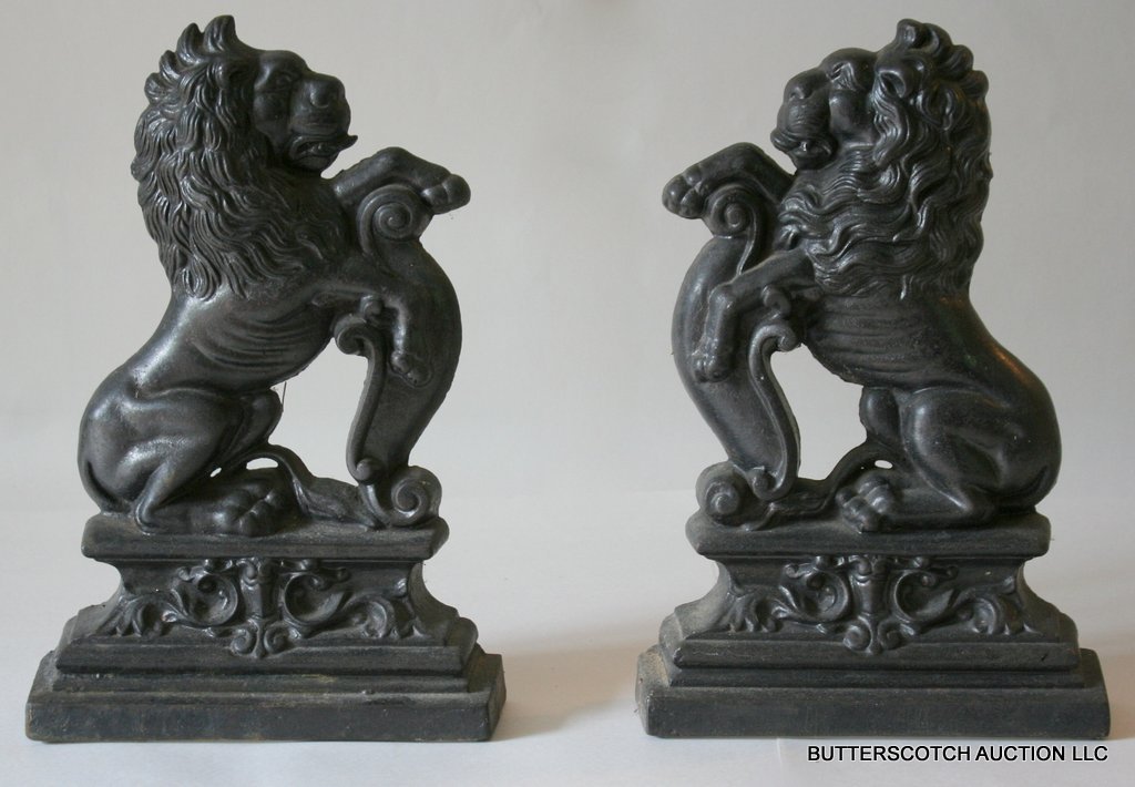 PAIR CAST IRON DOOR APPLIQUES IN THE FORM OF: RAMPANT LION, MARKED "ROWBOTHAM," H: 14"