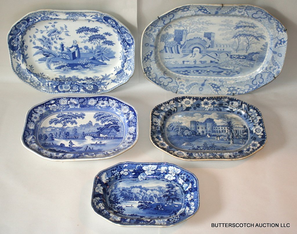 GROUP OF 5 MEDIUM BLUE TRANSFERWARE PLATTERS:: ONE "TURNBRIDGE CASTLE, SURRY", ONE RIVER LANDSCAPE, ONE SPODE - WOMAN AT WELL, ONE "SUFTON COURT, HEREFORDSHIRE"; PLUS ONE PALE BLUE "CASTLE PATTERN SHOWING 'THE GATE OF SEBASTIAN'" W/ CRACK SPODE 18