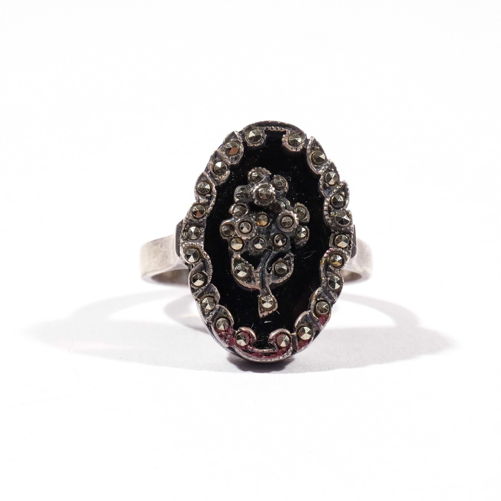ANTIQUE JET, MARCASITE, & 14k WHITE GOLD RING: With faint mark to band interior, size 7.5, 5.5g Provenance: Private collection, Greenwich Village, NY