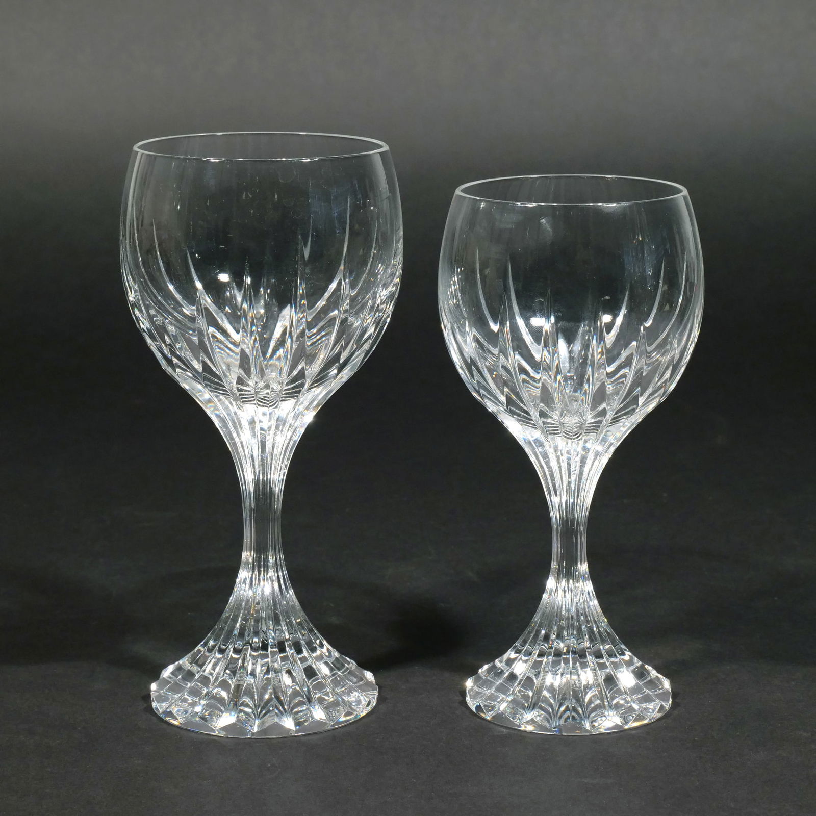 (24pc) BACCARAT MASSENA CRYSTAL GLASSES: Comprising two boxed sets of six Massena water goblets (7 in. high), and two boxed sets of six Massena wine glasses (6-1/2 in. high), marked 'Baccarat France' to each base, in original Baccarat boxes