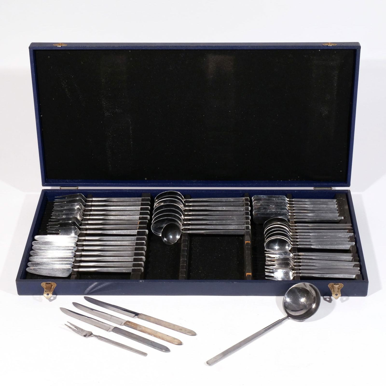 ERIK HERLOW "OBELISK" STAINLESS FLATWARE: Copenhagen Cutlery Denmark, stainless steel mid-century "Obelisk" pattern flatware by Erik Herlow, six piece place setting, service for eight [some pieces missing], comprising: 8 dinner forks, 7 lunch