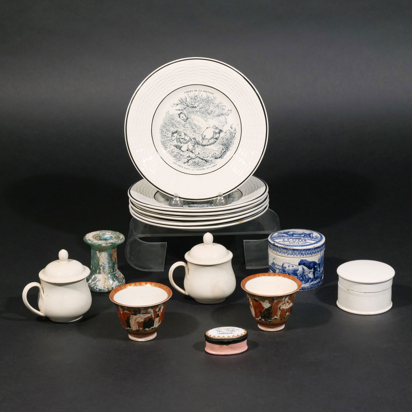 18th CENTURY & OTHER ANTIQUE PORCELAIN GROUP: Including a Roman glass candlestick, c. 200-300 BCE (2-1/2 in. high); a J.B. Thorn, London porcelain salve jar with lid, c. late 18th century; a Creil-Montereau faience blue and white transferware jar