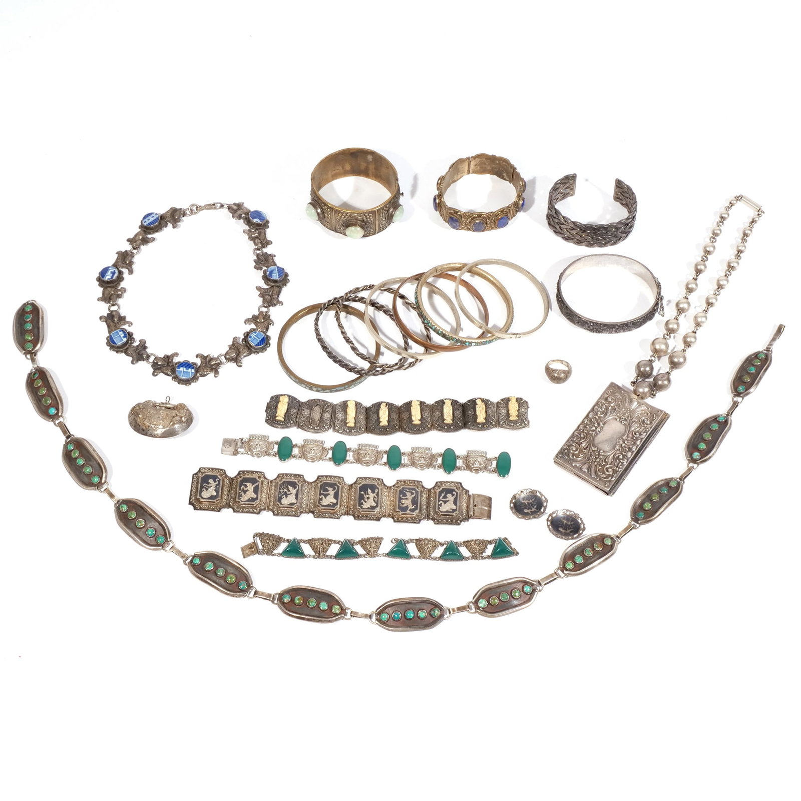 COLLECTION of SILVER & COSTUME JEWELRY: Mostly bracelets and necklaces, including a heavy silver & turquoise station necklace tested to sterling (30 in. long, 5 ozt), a sterling bracelet marked 'Siam', a silver necklace having seven station