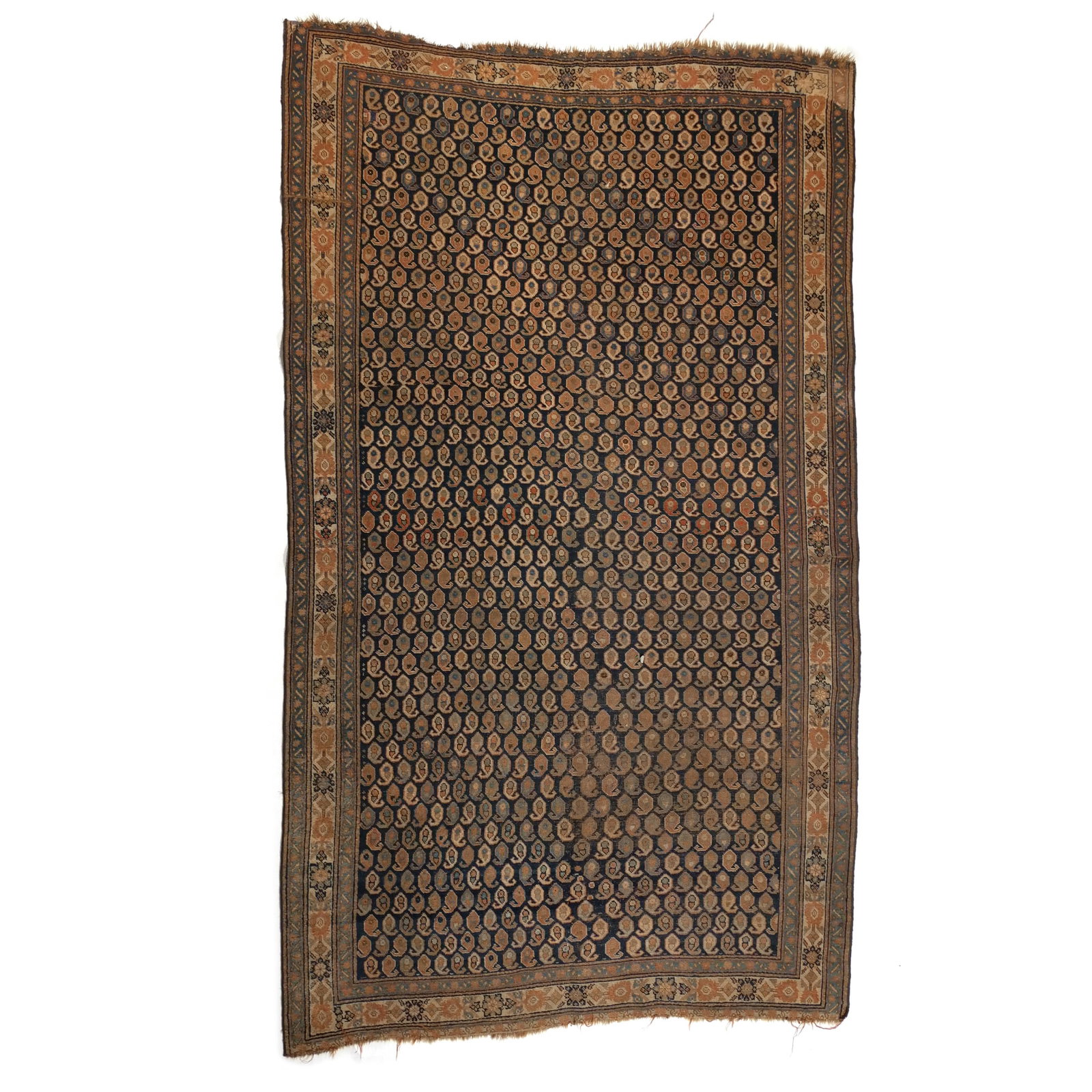 ANTIQUE PERSIAN CARPET: Early 20th century, having an all-over boteh pattern on an indigo ground h. 9 ft. 1 in. w. 5 ft. 5 in. Provenance: Descended through the family of a celebrated doctor and collector, South Salem, NY & 