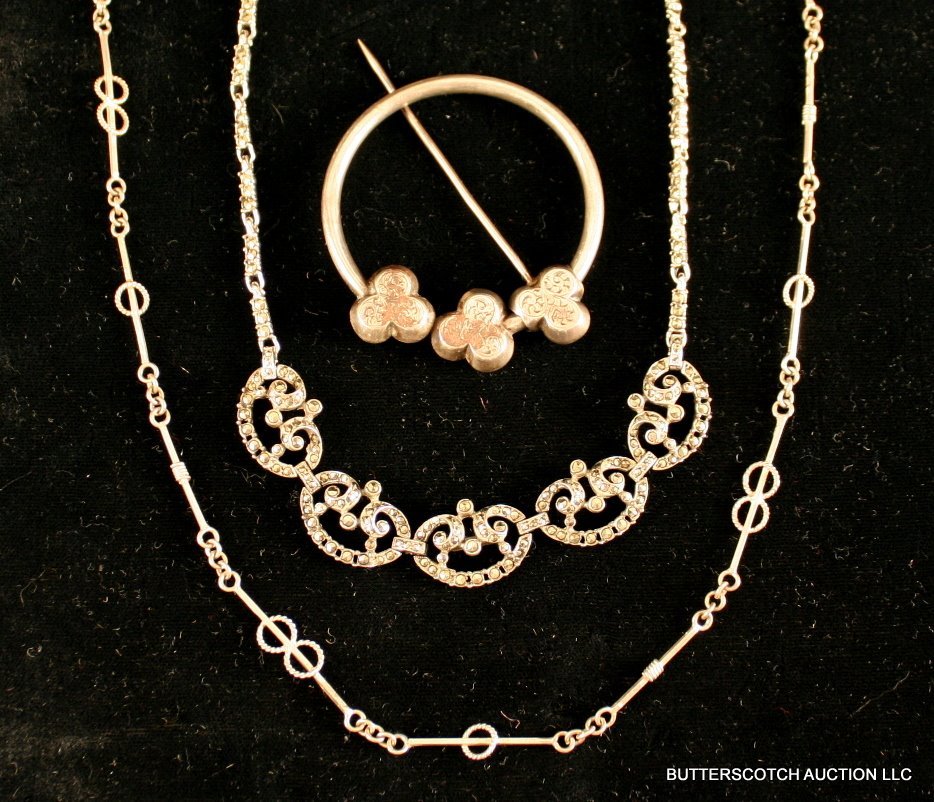 128) 3 PCS. ANTIQUE SILVER JEWELRY:: STERLING SILVER NECKLACE WITH INSET MARCASITE, W/ 4 C-SCROLL CARTOUCHES; SCOTTISH SILVER HAIR PIN (2 ½") AND A LONG SILVER NECKLACE