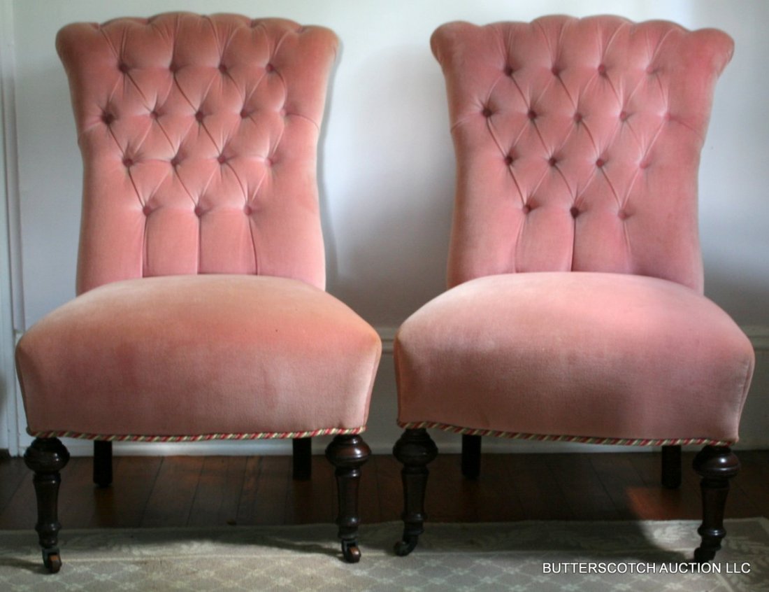 205) PAIR VICTORIAN TUFTED BACK SLIPPER CHAIRS W/: PAIR VICTORIAN TUFTED BACK SLIPPER CHAIRS W/ OVERALL VELVET UPHOLSTERY, THE FRONT LEGS W/ CASTERS, OVERALL H: 33.5" W: 21.5", H (SEAT): 16", ONE CHAIR W/ STAIN BEHIND BACK REST